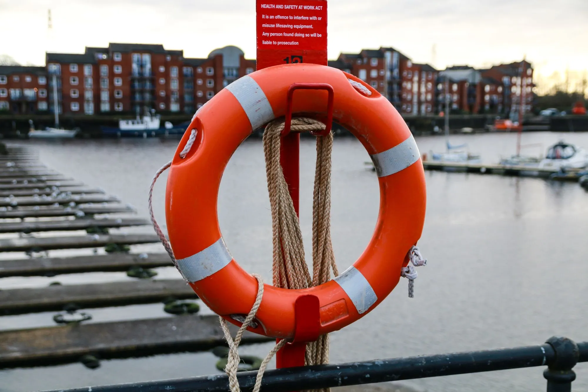 selective focus shot lifebuoy ring sailboat