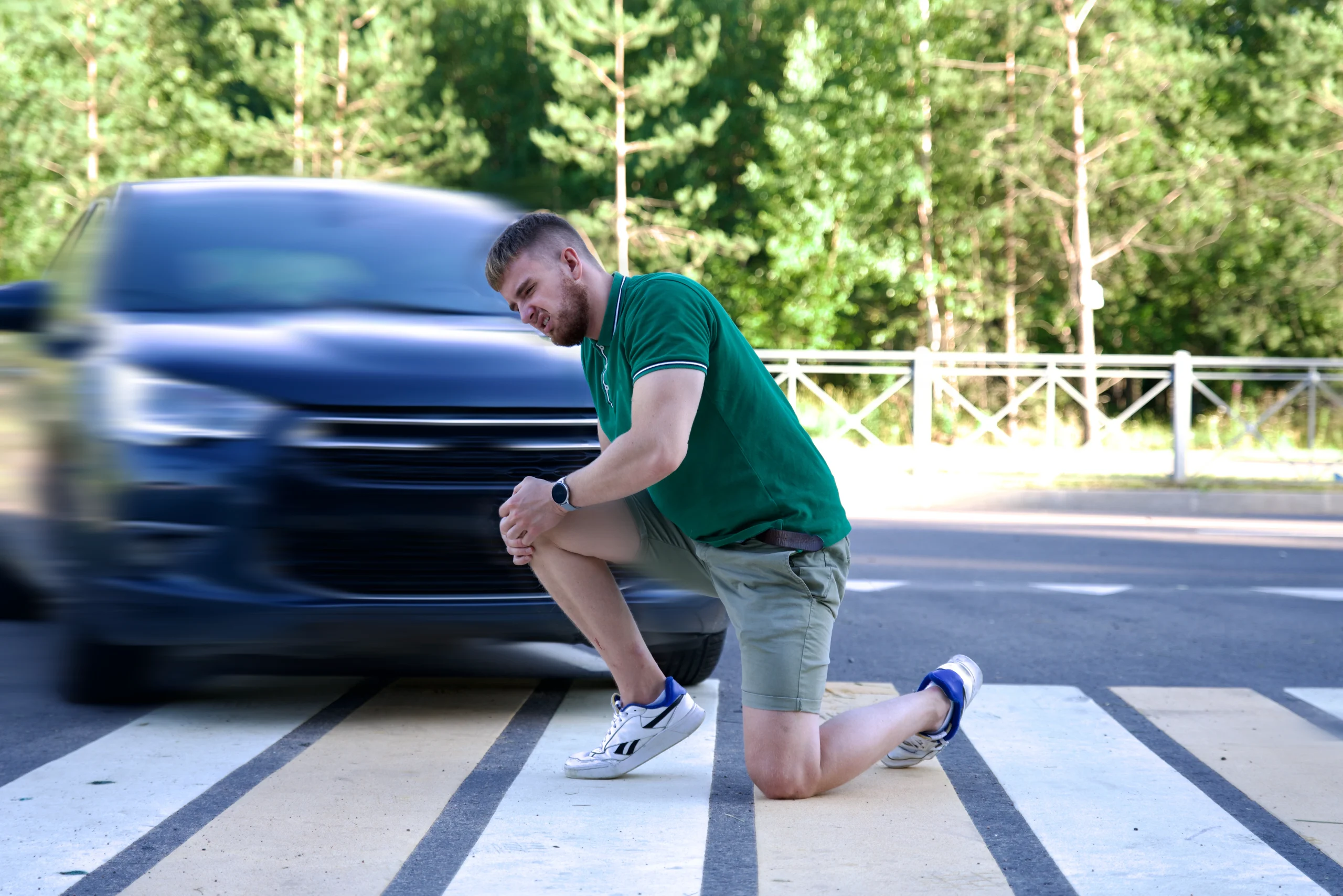 young-man-hit-by-car-pedestrian-crossing-dangerous-situation-road